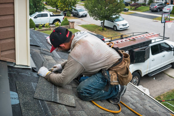 Professional Roofing technician working in Gowen, MI
